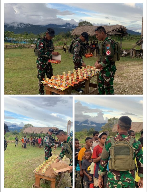 Satgas Yonif 641/Bru Berikan Makanan Snack untuk Anak-Anak Papua