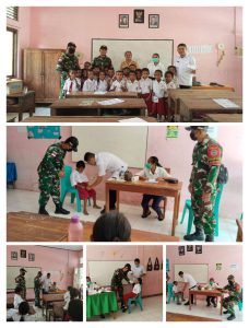 TNI Bersama Tenaga Kesehatan Gelar Pemberian Obat Cacing untuk Murid SDK Manamas