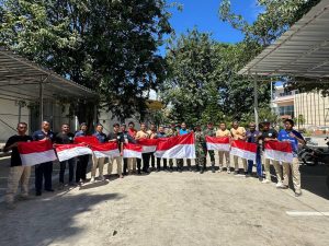 Satgas Pamtas Gelar Pelatihan PBB dan Distribusi Bendera di Pos Wini