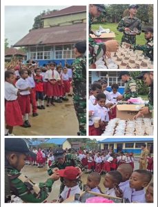 Dukung Program Pemerintah, Satgas Yonif 763/SBA Sediakan Makanan Bergizi di SD Inpres Kumurkek 