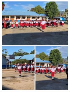 Satgas Pamtas Kewilayahan Yonif 763/SBA Pos Aisyo Bersama Sd Inpres 13 Kumurkek Laksankan Upacara Bendera